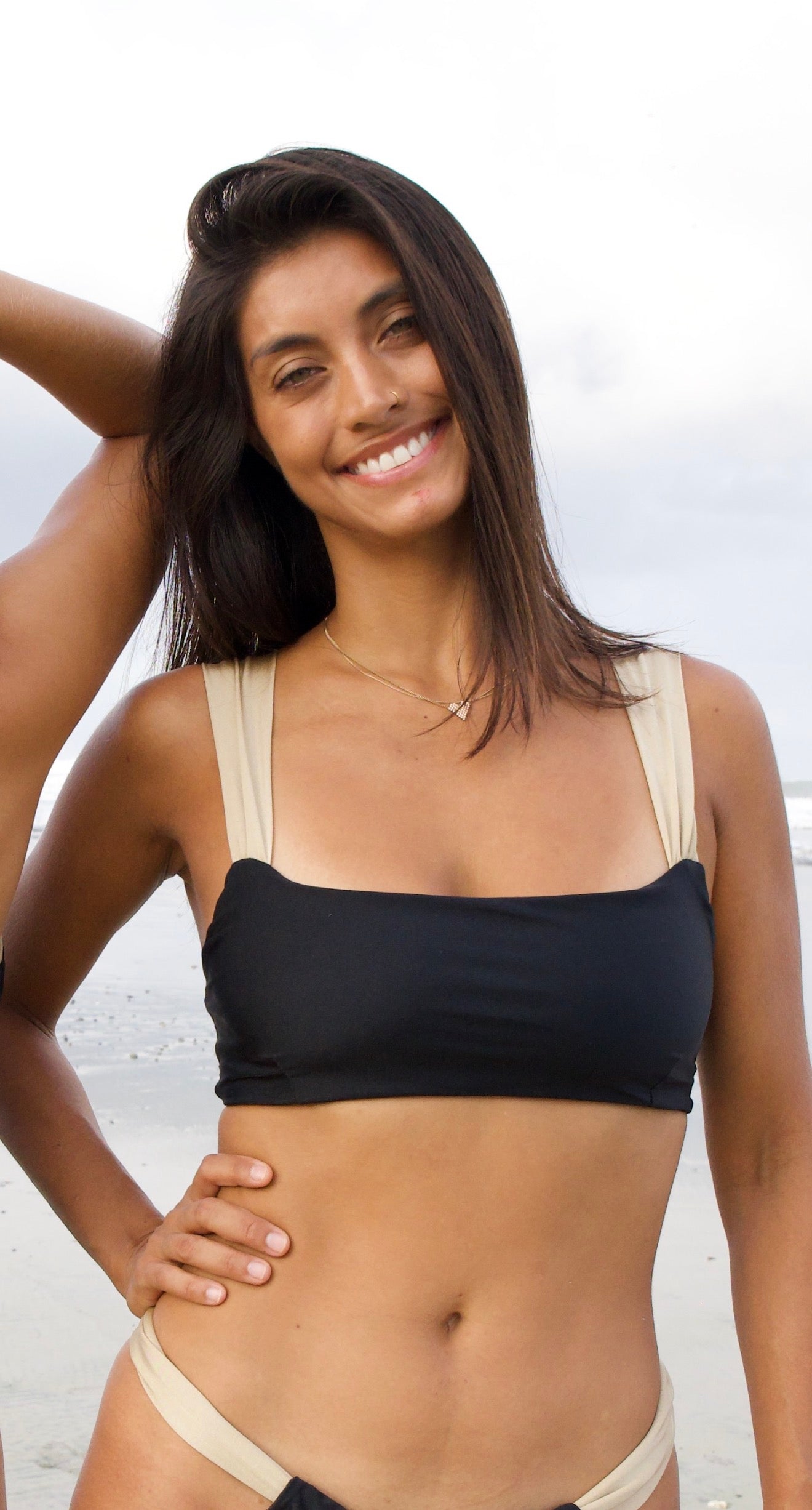 SERENA - Shiny black bandeau top with gold straps